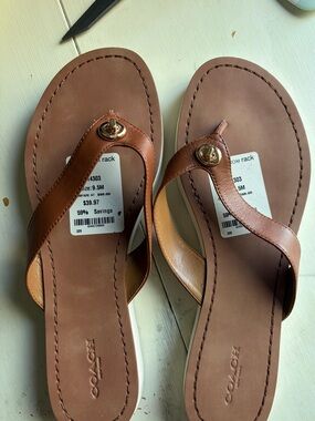 Coach Brown Leather Thong Sandals with Gold Logo Accent